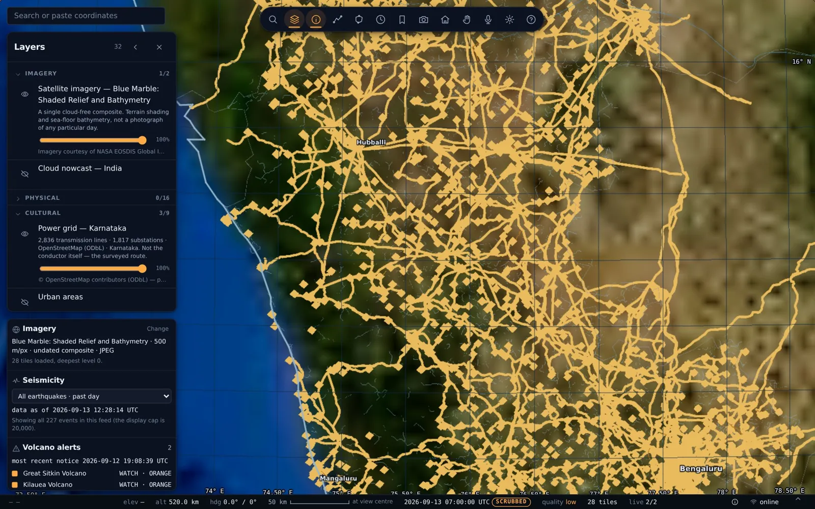 TerraLens globe over Karnataka showing transmission routes and substations in amber
